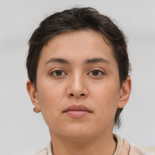 Neutral white young-adult female with short  brown hair and brown eyes
