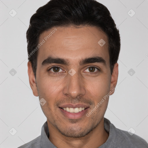 Joyful white young-adult male with short  black hair and brown eyes