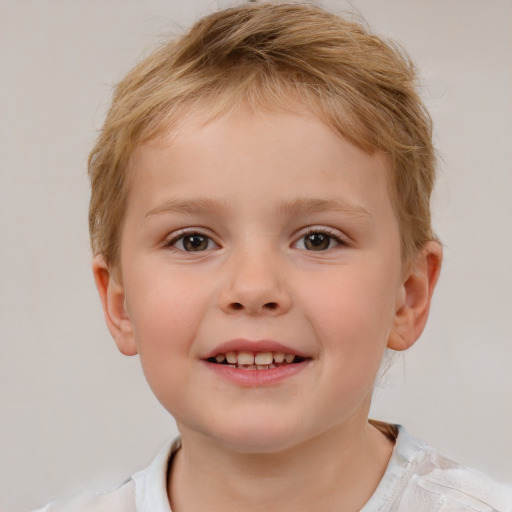 Joyful white child female with short  brown hair and brown eyes