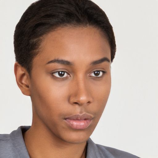 Neutral black young-adult female with short  brown hair and brown eyes