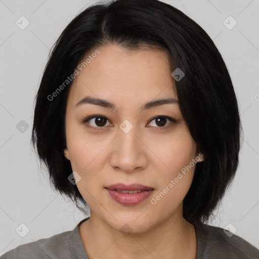 Joyful asian young-adult female with medium  black hair and brown eyes