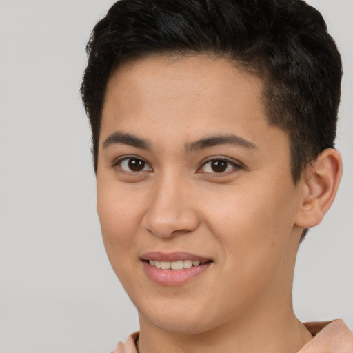 Joyful latino young-adult female with short  brown hair and brown eyes