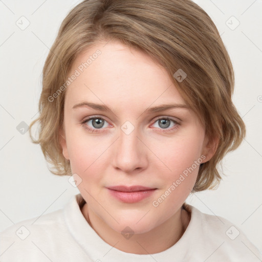 Joyful white young-adult female with medium  brown hair and blue eyes