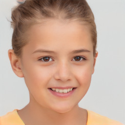 Joyful white child female with short  brown hair and brown eyes