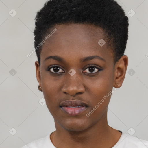 Joyful black young-adult female with short  black hair and brown eyes