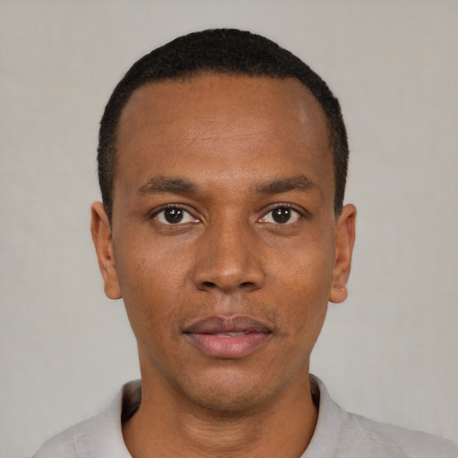 Neutral black young-adult male with short  black hair and brown eyes