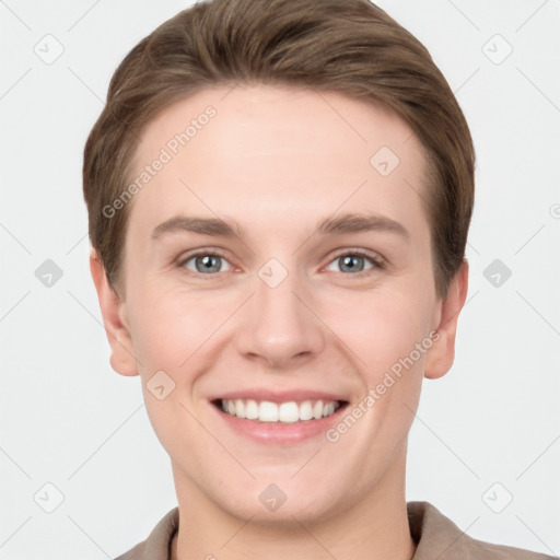 Joyful white young-adult female with short  brown hair and grey eyes