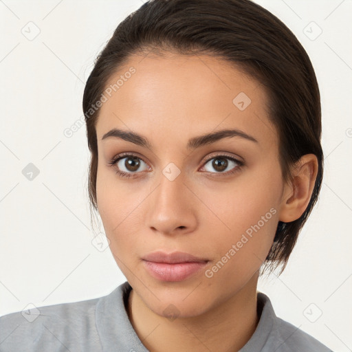 Neutral white young-adult female with medium  brown hair and brown eyes