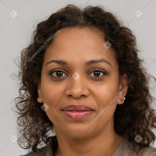 Joyful black young-adult female with medium  brown hair and brown eyes