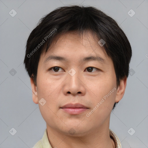 Neutral asian young-adult male with short  brown hair and brown eyes