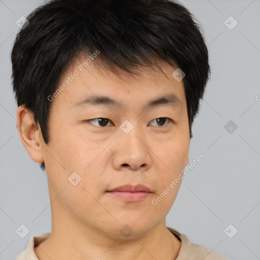 Neutral asian young-adult male with short  brown hair and brown eyes