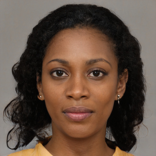 Neutral black young-adult female with long  black hair and brown eyes