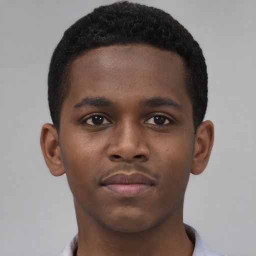 Neutral black young-adult male with short  brown hair and brown eyes
