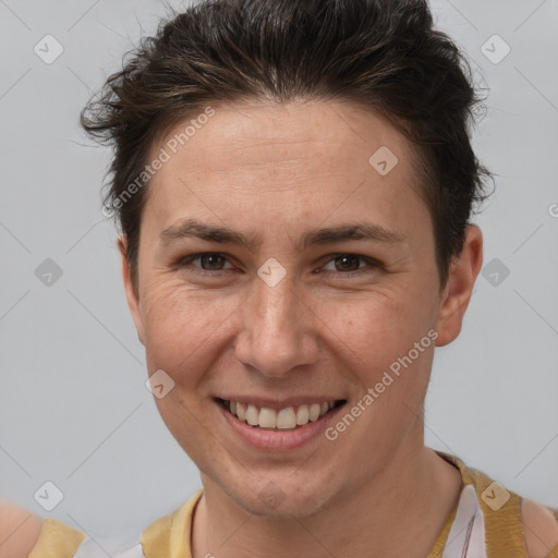 Joyful white adult female with short  brown hair and brown eyes