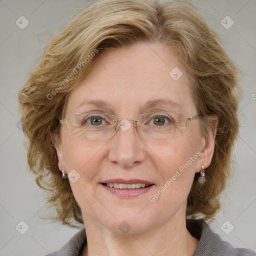 Joyful white adult female with medium  brown hair and blue eyes