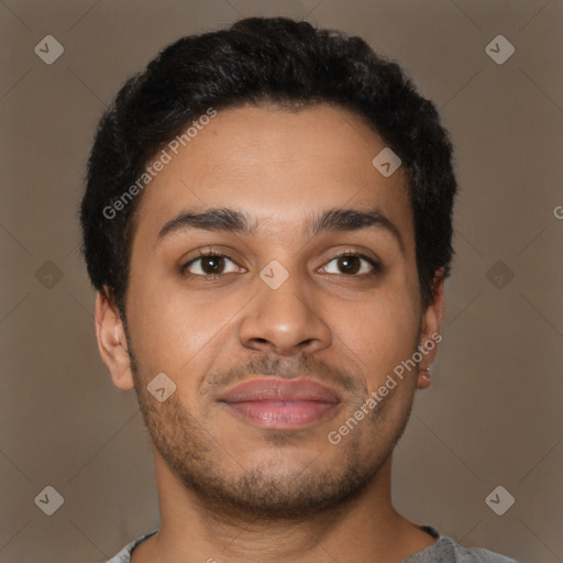 Joyful latino young-adult male with short  brown hair and brown eyes