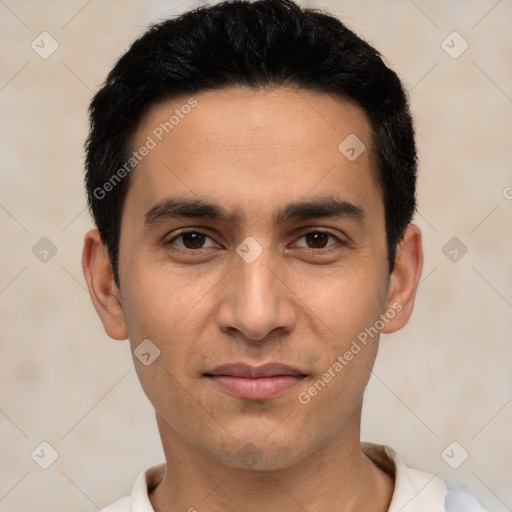 Joyful white young-adult male with short  black hair and brown eyes