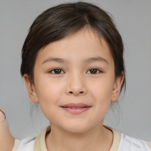 Joyful white child female with medium  brown hair and brown eyes
