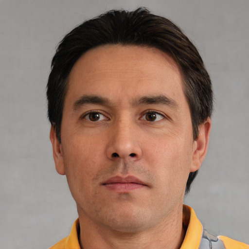 Neutral white adult male with short  brown hair and brown eyes