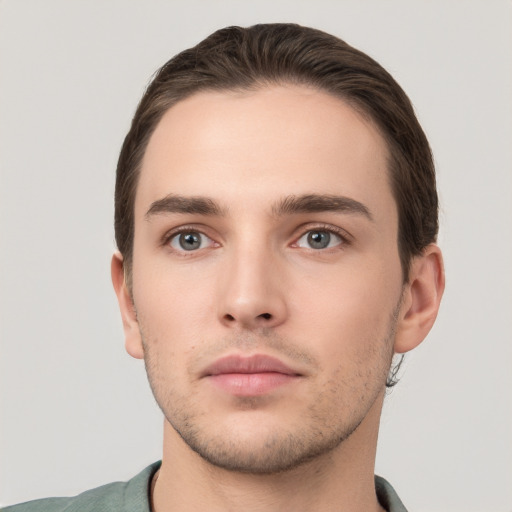 Neutral white young-adult male with short  brown hair and brown eyes