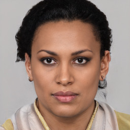 Neutral latino young-adult female with short  black hair and brown eyes