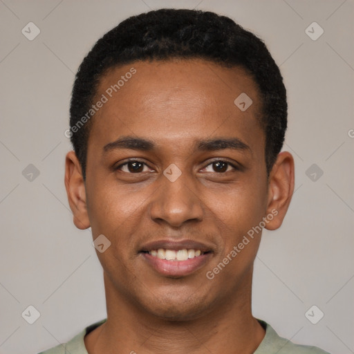 Joyful black young-adult male with short  black hair and brown eyes