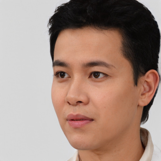 Neutral asian young-adult male with short  black hair and brown eyes