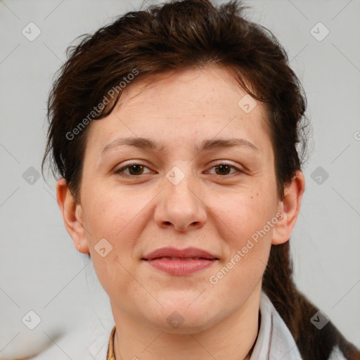 Joyful white adult female with medium  brown hair and brown eyes