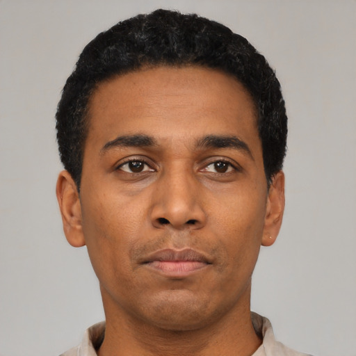 Neutral black young-adult male with short  black hair and brown eyes
