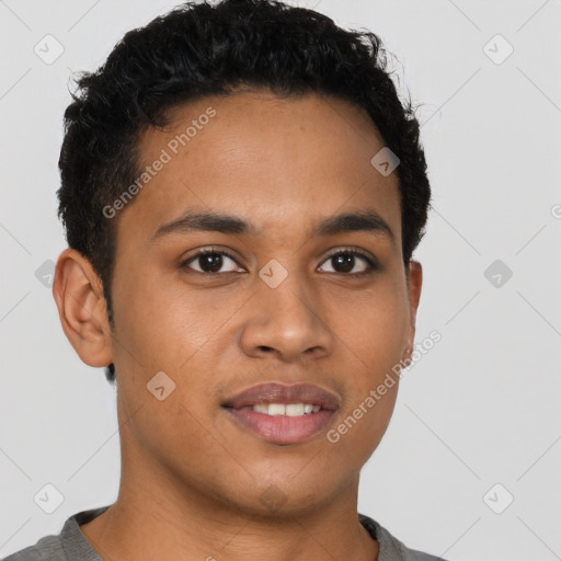 Joyful latino young-adult male with short  brown hair and brown eyes