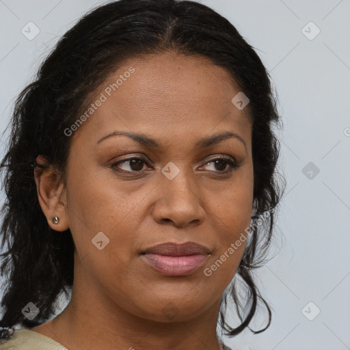 Joyful black young-adult female with medium  brown hair and brown eyes