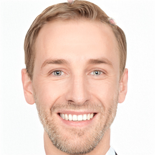 Joyful white adult male with short  brown hair and grey eyes