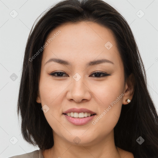 Joyful asian young-adult female with long  brown hair and brown eyes