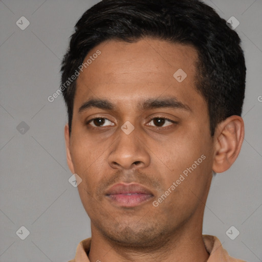 Neutral latino young-adult male with short  black hair and brown eyes