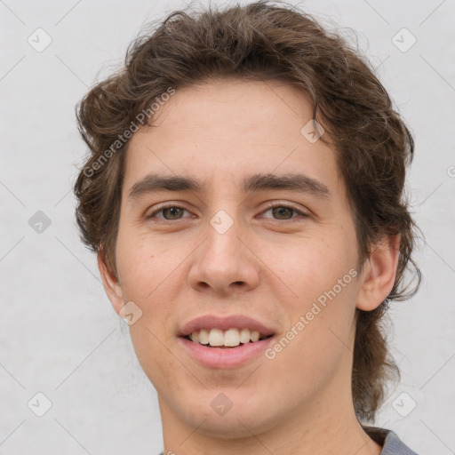 Joyful white young-adult male with medium  brown hair and brown eyes