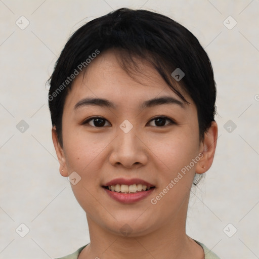 Joyful asian young-adult female with short  brown hair and brown eyes