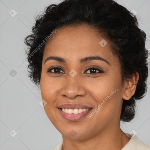 Joyful latino young-adult female with short  brown hair and brown eyes