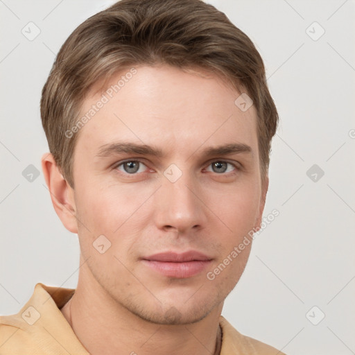 Neutral white young-adult male with short  brown hair and grey eyes