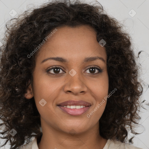 Joyful black young-adult female with medium  brown hair and brown eyes