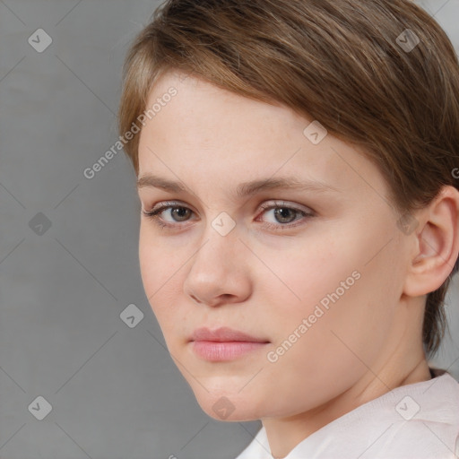 Neutral white young-adult female with short  brown hair and brown eyes