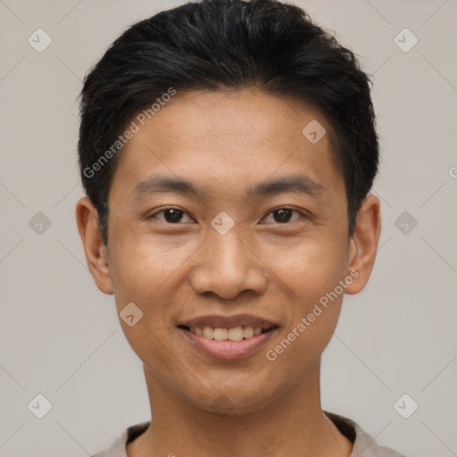 Joyful asian young-adult male with short  black hair and brown eyes