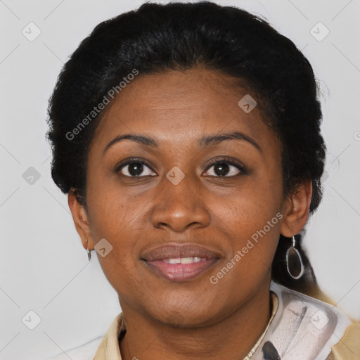 Joyful black adult female with short  brown hair and brown eyes