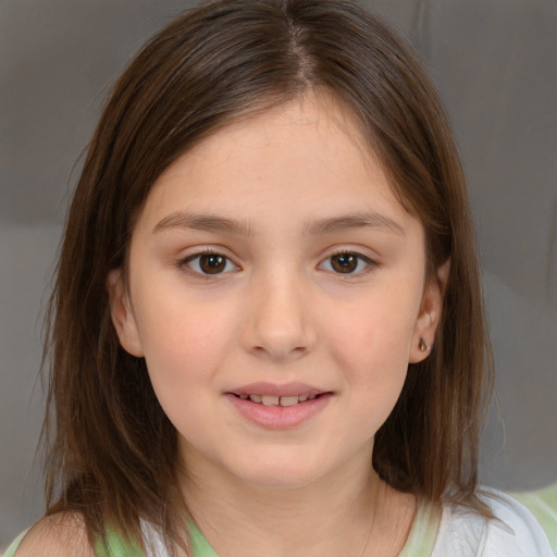 Joyful white child female with medium  brown hair and brown eyes