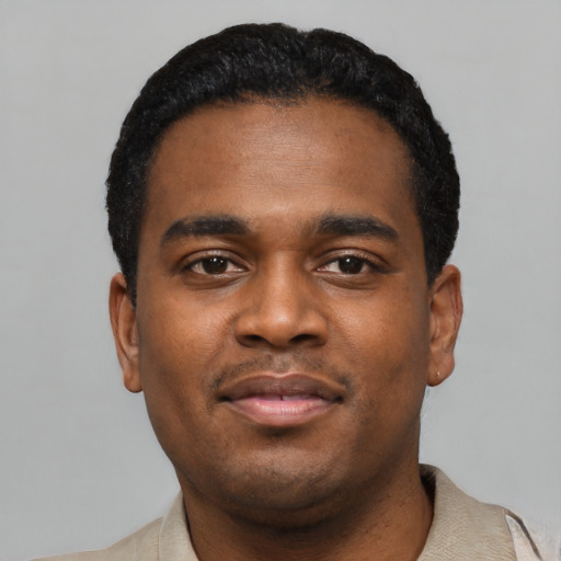 Neutral black young-adult male with short  black hair and brown eyes