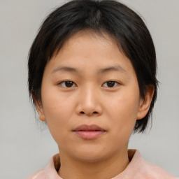 Neutral asian young-adult female with medium  brown hair and brown eyes