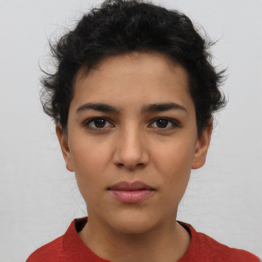 Neutral latino young-adult female with short  brown hair and brown eyes