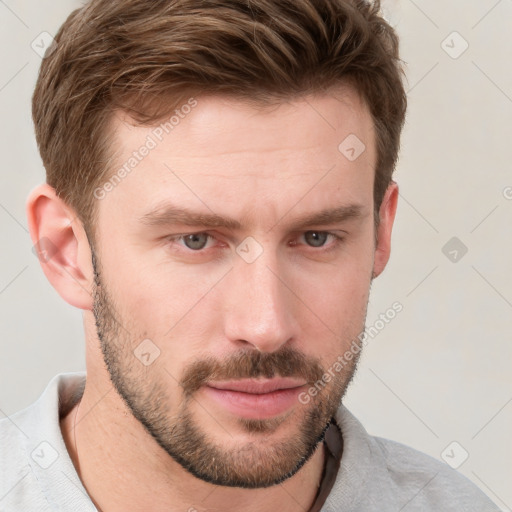 Neutral white young-adult male with short  brown hair and grey eyes