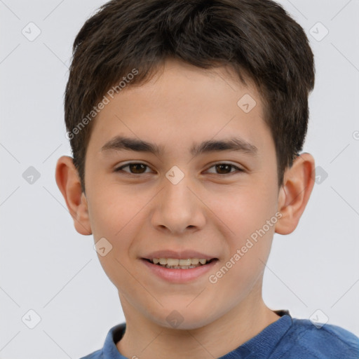 Joyful white child male with short  brown hair and brown eyes