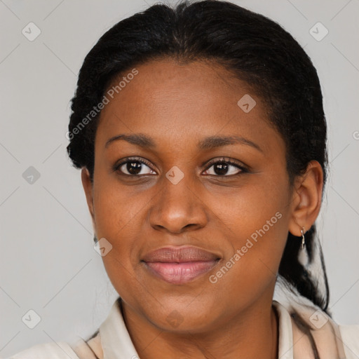 Joyful latino adult female with medium  brown hair and brown eyes