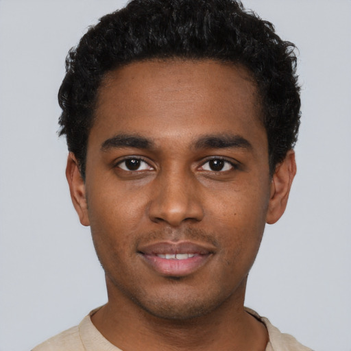 Neutral black young-adult male with short  brown hair and brown eyes